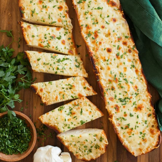 Garlic bread with mozzarella cheese.